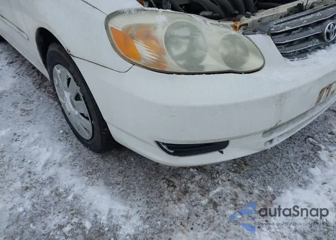 2003 Toyota Corolla Le z USA, uszkodzony, nr VIN JTDBR32E732015404